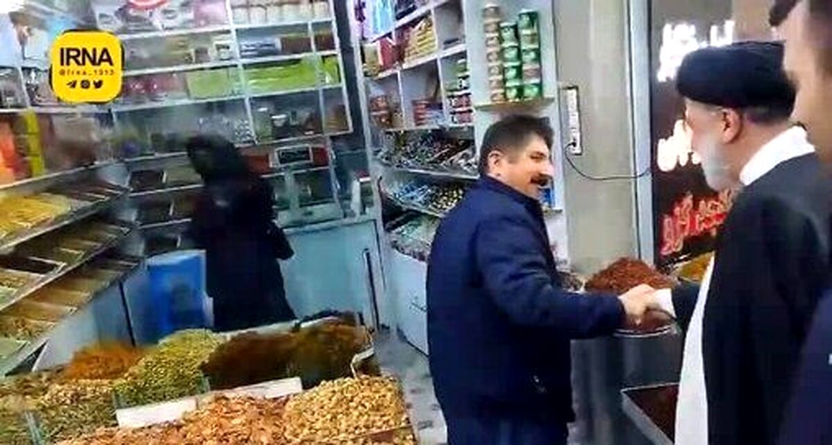 چرا زن سنندجی در بازار، پشتش را به رئیس جمهور کرد ؟ + فیلم